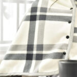 Poncho à carreaux tendance