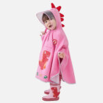 Poncho enfant motif dinosaure