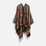 Design artisanal mexicain sur poncho marron