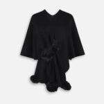 Pompons sur poncho