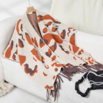 design poncho frangé