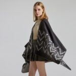 Poncho en polyester et acrylique