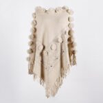 poncho avec pompon