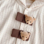poncho ours peluche