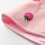 poncho rose avec pompon