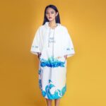 poncho pour surfeur bleu